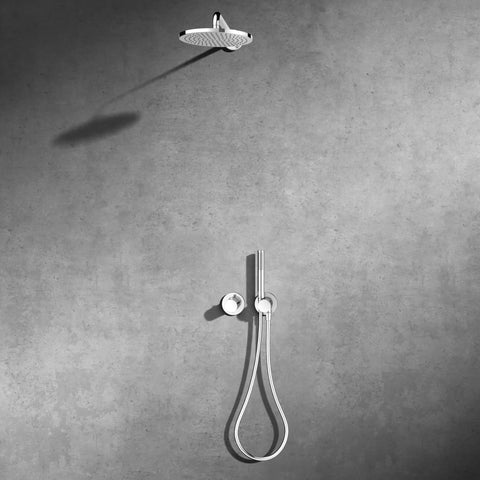 Sleek Recessed Shower System With Thermostatic Control And Anti Scald Safety Lock Chrome Plated Finish Integrated Diverter Valve and round rain head mounted on a wall.