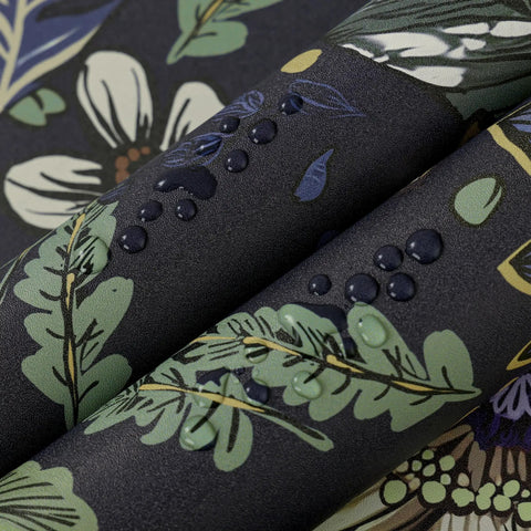 Close-up of Slay Your Walls With This Dope Blue Boho Wallpaper Peel And Stick Vintage Floral Pattern with water beads on vinyl.
