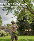 Heavy Duty 24V Brushless Cordless Pole Saw With Eight Inch Guide Bar Cracks Through Thick Limbs And Garden Overhaul Makes Pruning A Total Cinch Includes Rugged Carry Bag For Backyard Titans in use, demonstrating 7.5 ft - 9.5 ft reach.