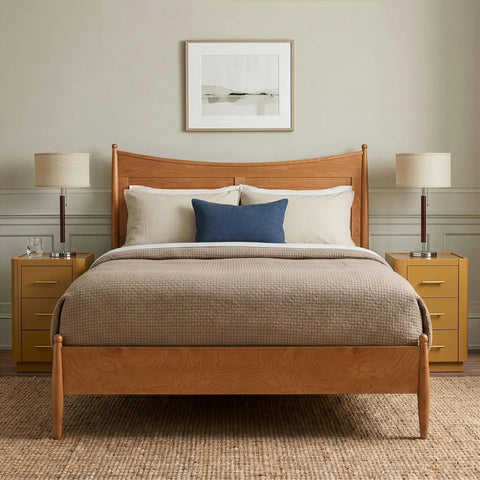 Bedroom with wooden bed, blue pillow, and two Carter LED Bedside Lamps with soft ambient glow on nightstands, ideal for desks and living rooms.