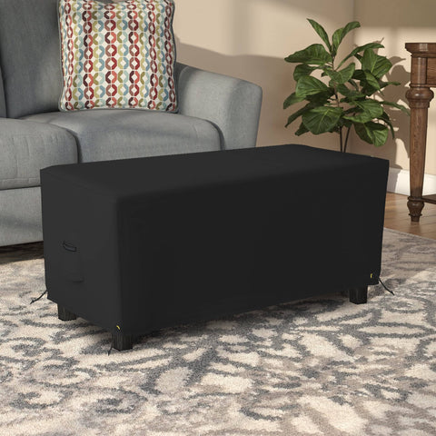 Rectangle Ottoman Cover For Outdoor Patio Furniture in black, on a living room rug, shows heavy duty 12 oz PVC coated polyester.