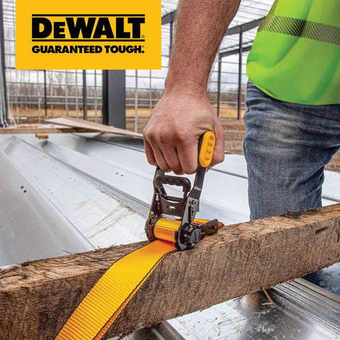 Person using Beefed-Up Mid-Weight Ratchet Tie Down Straps 1.5 Inch By 16 Foot 3300 Pound Break Strength on wooden beam
