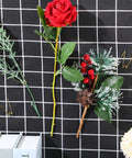 Super Slick Gold Cubicle Hooks For Fabric Partition Walls Tough Stainless Steel Wire Clips holding faux flowers on a grid fabric.