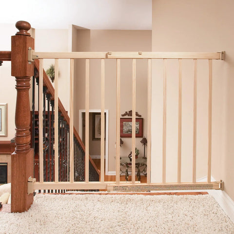 Walk-Through Top Of Stairs Baby Gate In Natural Wood With Four Point Mount, One Hand Release in home setting