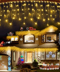 1620 LED 164ft Outdoor Christmas Lights Diamond Inspired Faceted Curtain String Lights with 360 Drops installed on house