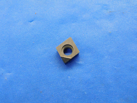 1 Piece Pro Grade PCD Tipped Carbide Turning Insert Diamond Tip CC061600PCD For Precision CNC Turning And Milling In High Performance Tooling With Superior Finish Long Tool Life And Low Friction Wear, square insert on blue mat