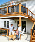 Round Wrought Iron Look Stair Balusters Heavy Duty Interior Exterior Deck Railing Spindles Built Tough For Home Projects 44 Inches Tall Sharp Satin Black Coating 15 Piece Package with family on deck.