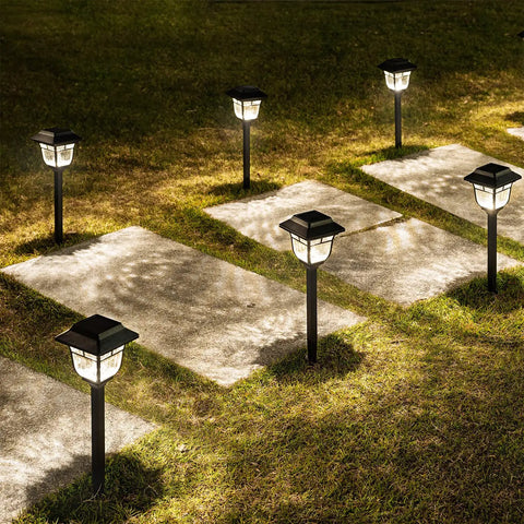 Solar Pathway Lights 4 Pack Outdoor Garden LED Lights IP65 Waterproof Glass And Metal Walkway Landscape Lighting at sunset