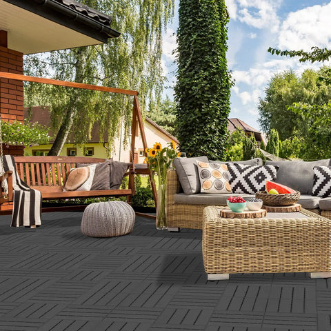 Interlocking Plastic Deck Tiles 12x12 Inch, 36 Pack Waterproof Outdoor Flooring for Balcony, dark grey tiles on patio.