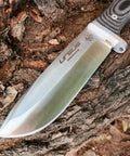 Survival Knife For Camping And Bushcraft With 14.5 cm Drop Point Blade In Stainless MOVA 1.4116 Black Micarta Handle