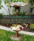 Outdoor Solar Lighted Bird Bath Fountain With Planter And Integrated Panel In Bronze Pedestal Water Feature For Lawn And Garden Scroll Accent Details Easy Fill Energy Saving Lit Night Light in garden setting.