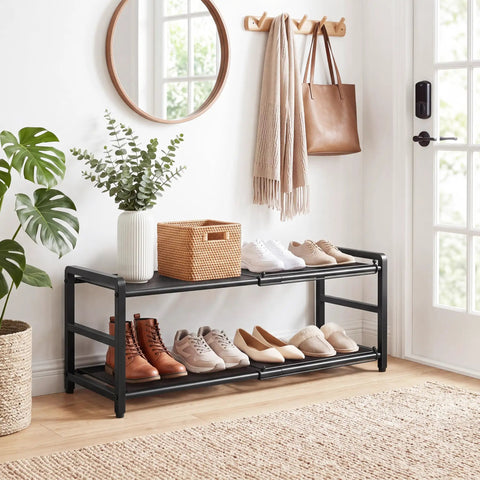Rock Solid Expandable Shoe Rack Black Two Tier Metal Closet Organizer Holds Eight Pairs Of Sneakers in stylish entryway setting.