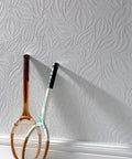 Paintable Textured White Eden Wallpaper Roll 20.5 Inch Wide By 11 Yard Long 56 Sq Ft Coverage Smooths Wall Bumps With Easy DIY Paint To Match Your Decor, shown with floral pattern.