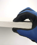 Side view of Lynn Manufacturing ceramic fiber board insulation, 20x20x3/4 in, gray board held by blue-gloved hand
