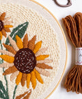 Sunflower Punch Needle Kit For Beginners - No-Fuss DIY Embroidery Starter Set with finished sunflower on cream fabric and thread