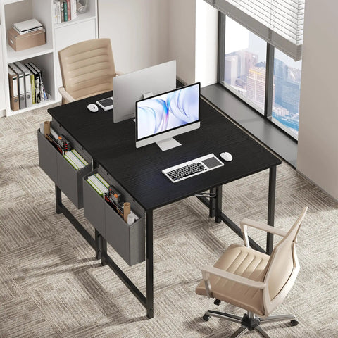 Space Saving Computer Desk For Small Spaces 31 Inch Home Office Table For Gaming And Study With Large Surface And Sturdy Steel Frame Includes Storage Bag For Bedroom Black, shown with office chairs and computer setup.