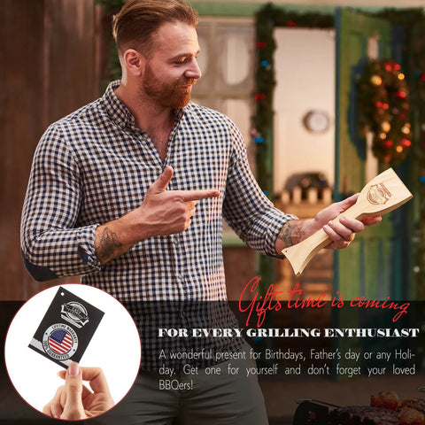 Man holding Wood Grill Scraper With QuickClean Tech Bristle Free BBQ Brush Alternative For Safe Grillin in a festive setting.