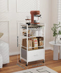 Modern White Coffee Bar Cabinet On Wheels With Ample Storage And Drawer 5 Tier Coffee Station Cart 33.6 Inch High Mobile Liquor Buffet Sideboard For Home Kitchen in a living room setting.