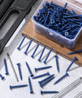 Built Tough 200 Piece Concrete Screws 3/16 X 1-3/4 Inch in blue, displayed with drill bits and a toolbox.