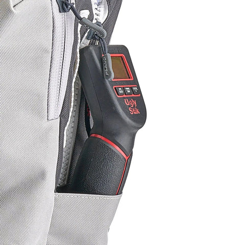 Close-up of gear pocket on Weekend Warrior Tackle Backpack 3700 Series for fishing, showing fishing tools and durable material.