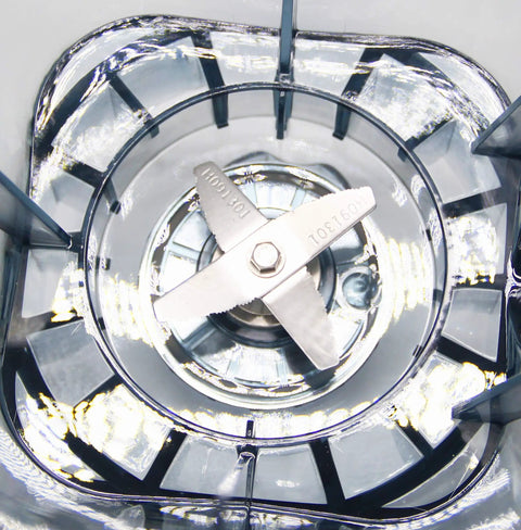 Heavy Duty Commercial Blender Packing Two Eight Zero Zero Watts And Six Liter Stainless Tank close-up of stainless steel blades.