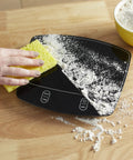 Waterproof Digital Kitchen Scale with 11 Pound Capacity Pro Grade Precision Ultra Accurate to 0.01 Oz and 1 Gram Tare Function being cleaned