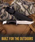 119 Special Hunting Knife 6 Inch Fixed Blade Full Tang 420HC Clip Point Phenolic Handle Sheath Included on camo blanket