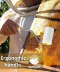 Beekeeper using Pro Grade Honey Uncapping Roller Tool for Beekeepers with sharp plastic prongs on honeycombs