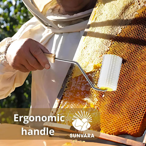 Beekeeper using Pro Grade Honey Uncapping Roller Tool for Beekeepers with sharp plastic prongs on honeycombs