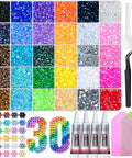 40,000 Pcs Resin Jelly Rhinestones Kit In 30 Vibrant Colors 3Mm Flatback Rhinestones Includes 4 Tubes B7000 Jewelry Glue And Essential Tools All In One Bedazzling DIY Arts And Crafts Gift Set displayed with tools and glue