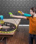 Boys playing with Eight Feet Of Track SpongeBob Hot Rod Boat Slot Car Race Set With Dual Player Racing Lap Counter Three Track Layouts