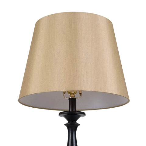 Close-up of light gold tapered drum shade from Gavin Lamp Set Duo In Golden Flecked Bronze With Gold Highlights lamp.