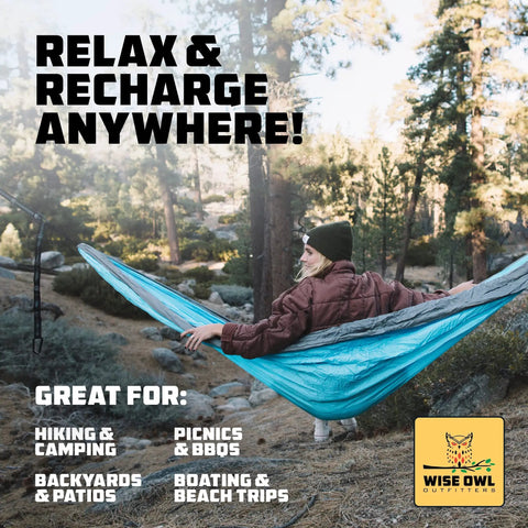 Person relaxing in a Portable Camping Hammock With Tree Straps Up To 400 Lbs Built For Outdoor Adventures Easy Setup In Seconds.