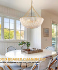 Five Light 20 Inch Boho Wood Beaded Chandelier For Dining Room And Living Spaces over a round white dining table