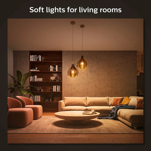 Living room with Smart Light Starter Kit With Bridge And Four 75W A19 LED White Ambiance Bulbs, soft ambient lighting.