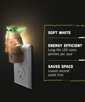 Baby Yoda Night Light Plug In With Dusk To Dawn Sensor on outlet next to energy saving text
