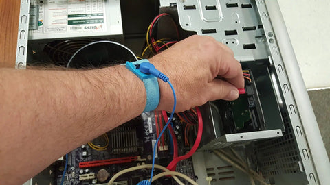 Person wearing ESD Anti Static Wrist Strap With Removable Cable For All Wrists 6 Foot Cord Adjustable Washable Wristband