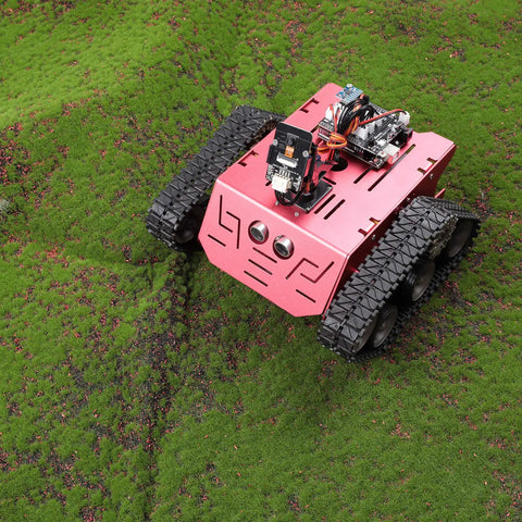 Conqueror Robot Tank Kit With UNO R3 Controller for Arduino on grass illustrating tracked drive and sensor components.