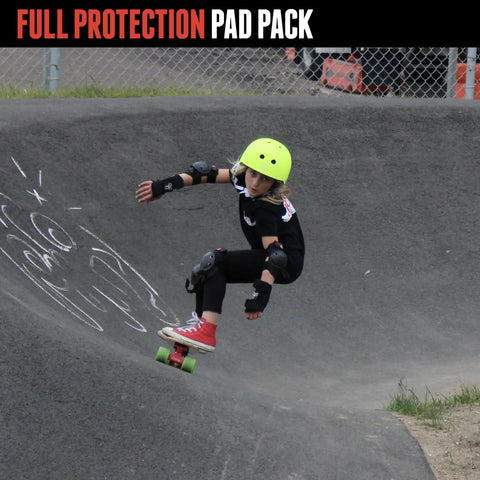 Child skating in full protection pad pack with All In One Saver Series Pad Set With Kneesavers Elbowsavers And Wristsavers