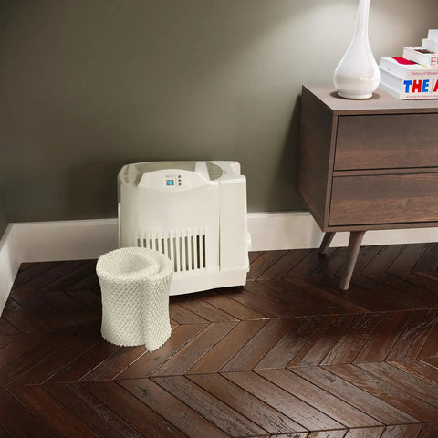 Replacement Wicking Humidifier Filter For MA1201 With Honeycomb Trapmax Technology Beige Wick Easy Install next to humidifier and cabinet.