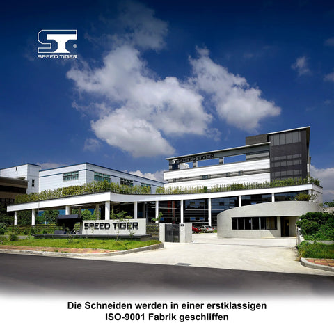 Speed Tiger logo on a modern factory exterior under a blue sky