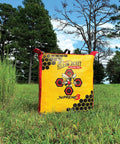 Yellow Jacket Supreme 3 Archery Target Bag Dual Sided 23 By 12 Inches Weatherproof 54 Layer Construction in a grassy field