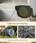 Image of wall mounted retractable garden hose reel with automatic rewind, 100 ft length in seaweed green, spraying water