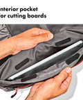Interior view of Outdoor Camp Kitchen Tool Roll Organizer For Travel And Camping showing a cutting board pocket and durable ripstop material.