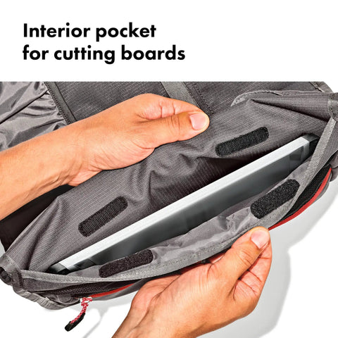 Interior view of Outdoor Camp Kitchen Tool Roll Organizer For Travel And Camping showing a cutting board pocket and durable ripstop material.