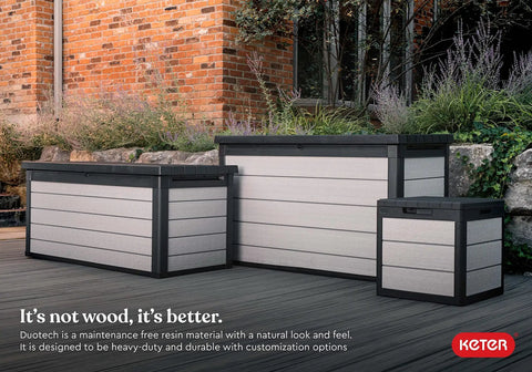 Denali 30 Gallon Resin Outdoor Storage Box And Patio Furniture Side Table For Pool And Garden Accessories Gray And Black All Weather Durable Resin With Wood Look Finish in garden setting.