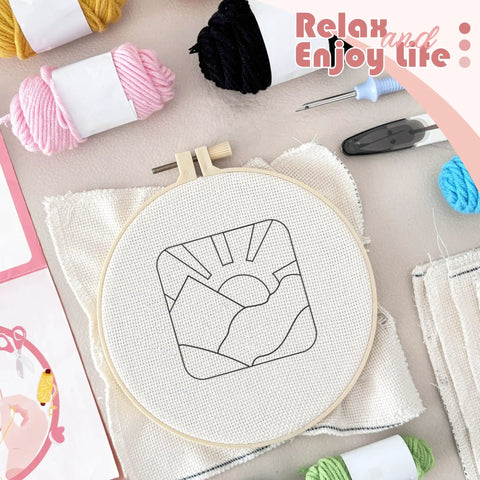 Easy To Use Punch Needle Coaster Kit For Beginners with tools, fabric, and yarn, showcasing landscape pattern in hoop