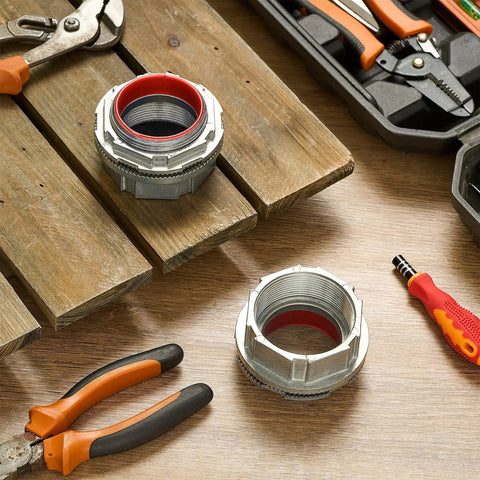 Pro Level Rock Solid 2 Piece Pack Of 2 Inch Watertight Conduit Hub Fittings Featuring Heavy Duty Rubber O Rings on wooden surface.