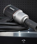 Shop Grade 3/4 Inch Drive Air Impact Wrench Featuring 1400 Ft Lbs Torque And 6000 Rpm Speed and adjustable handle with a power cord.