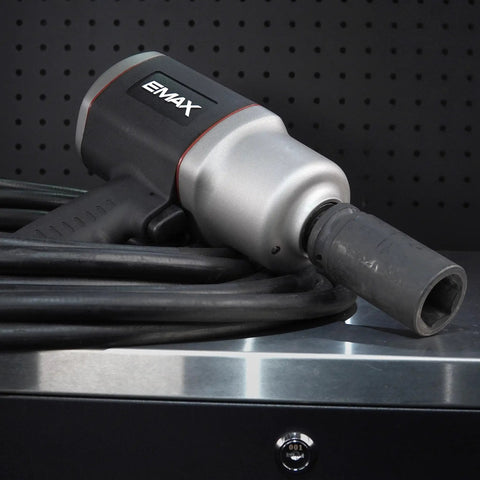 Shop Grade 3/4 Inch Drive Air Impact Wrench Featuring 1400 Ft Lbs Torque And 6000 Rpm Speed and adjustable handle with a power cord.